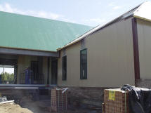 StrongGreen™  With Wall, Roof & Floor Structural Panels; Brick Veneer; Metal Roof