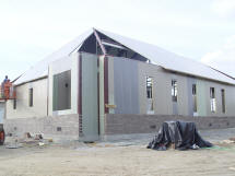 StrongGreen™ With Wall, Roof & Floor Structural Panels; Brick Veneer; Metal Roof